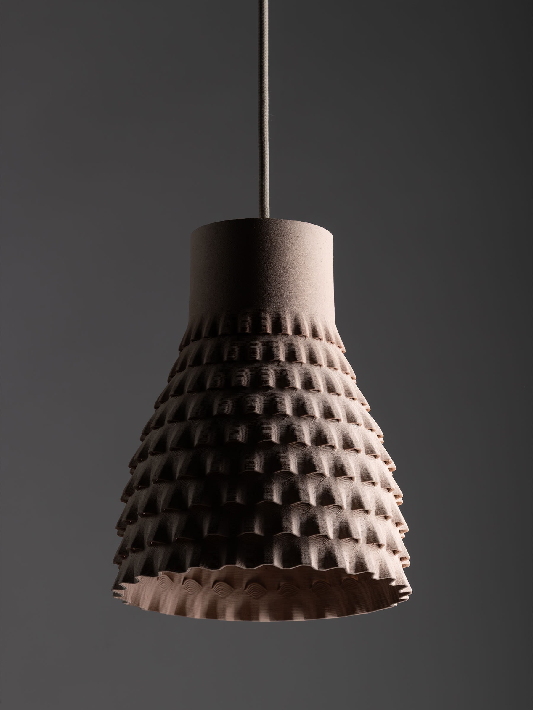 The Orion pendant lampshade in salmon pink